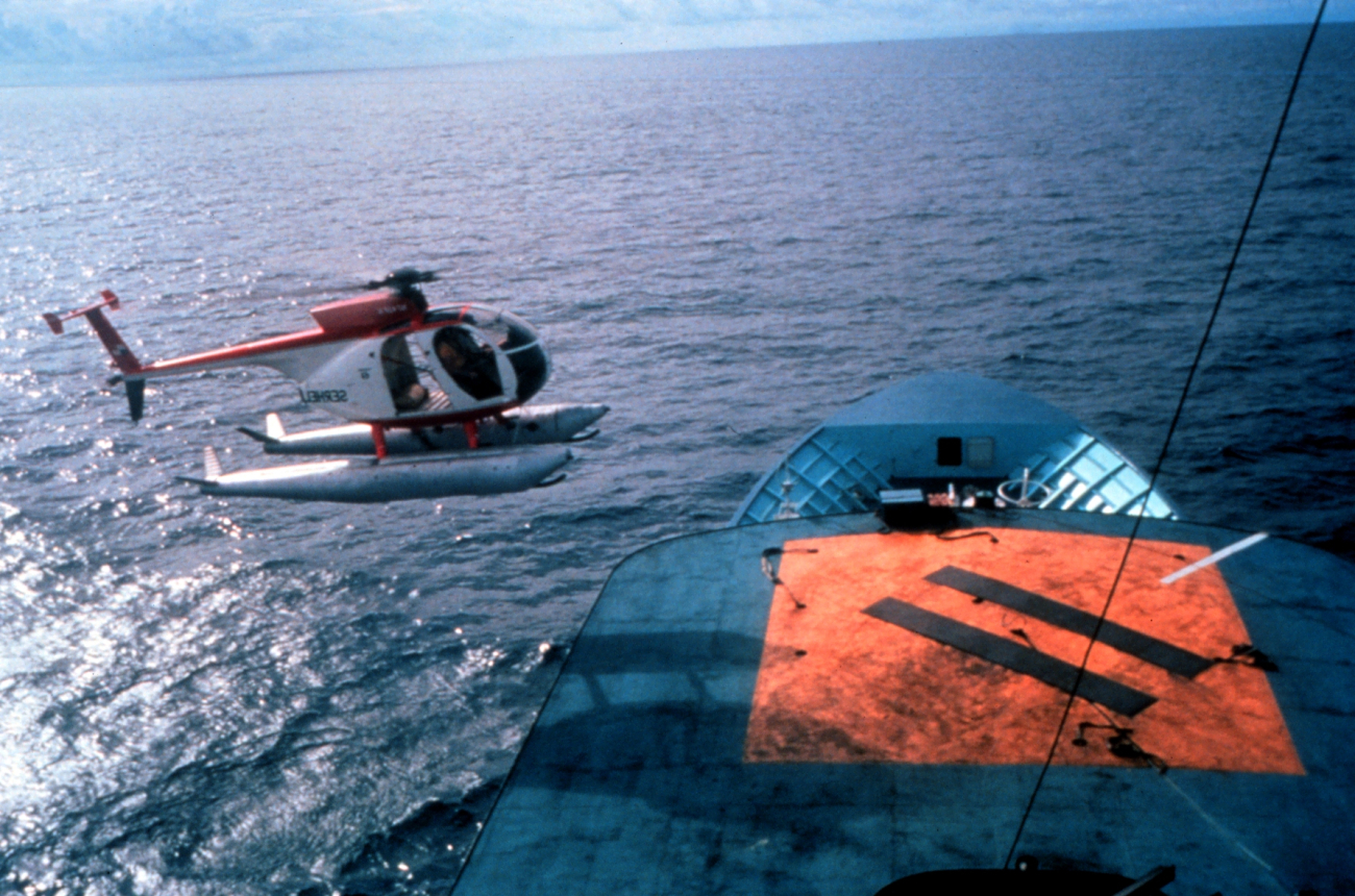Observation helicopter operating off tuna purse seiner