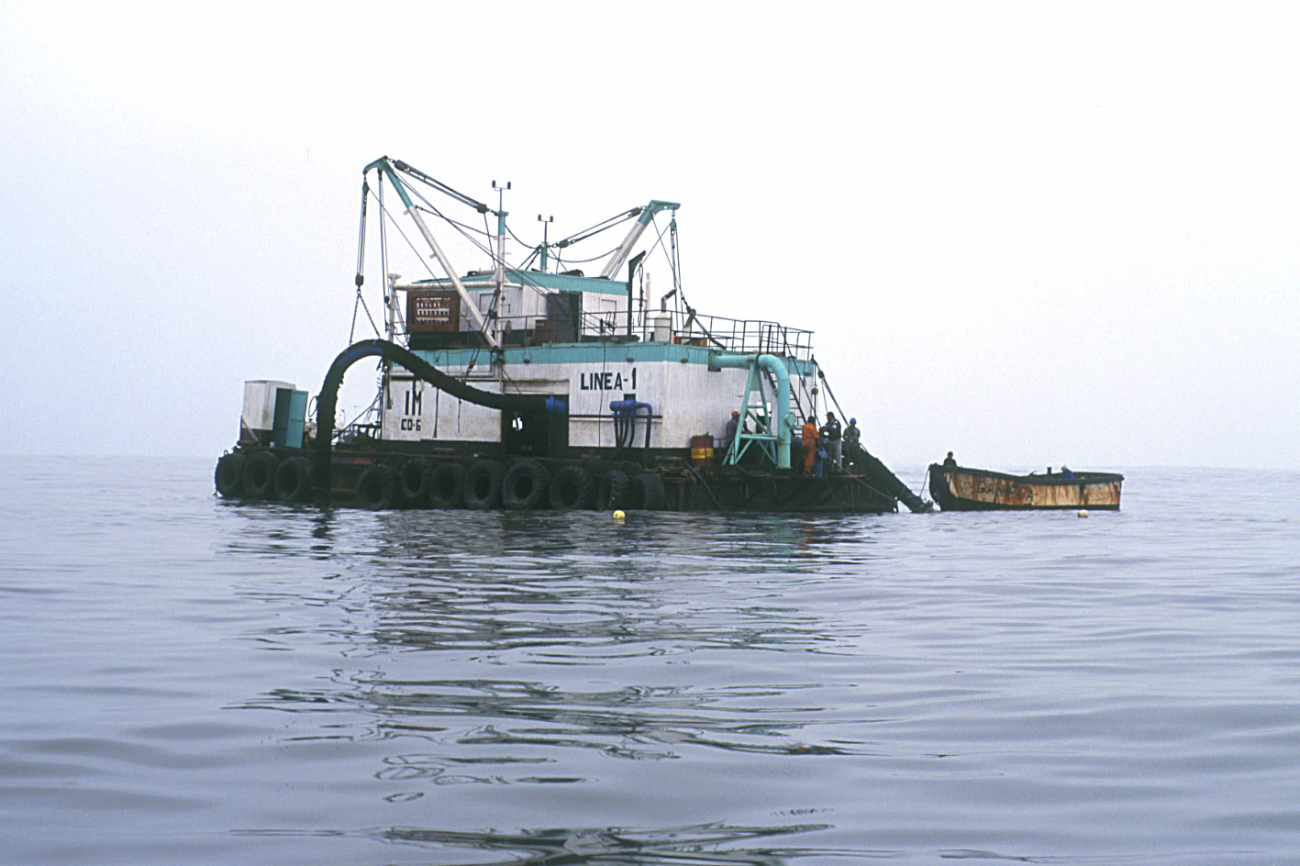 A chata lighter is used to transfer the catch from the fishing boat to theprocessing plant