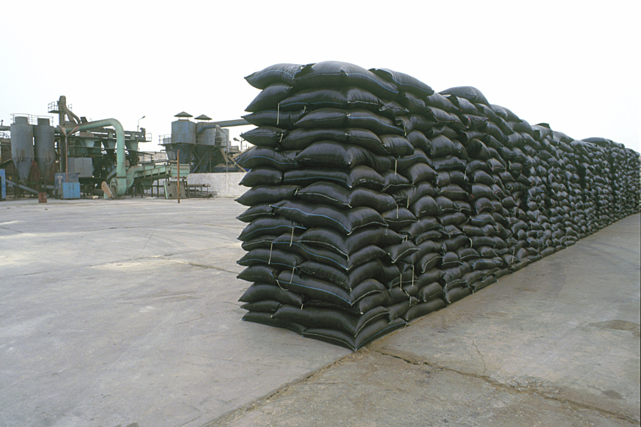 Sacks of anchovy fishmeal at Los Ferroles fishmeal plant