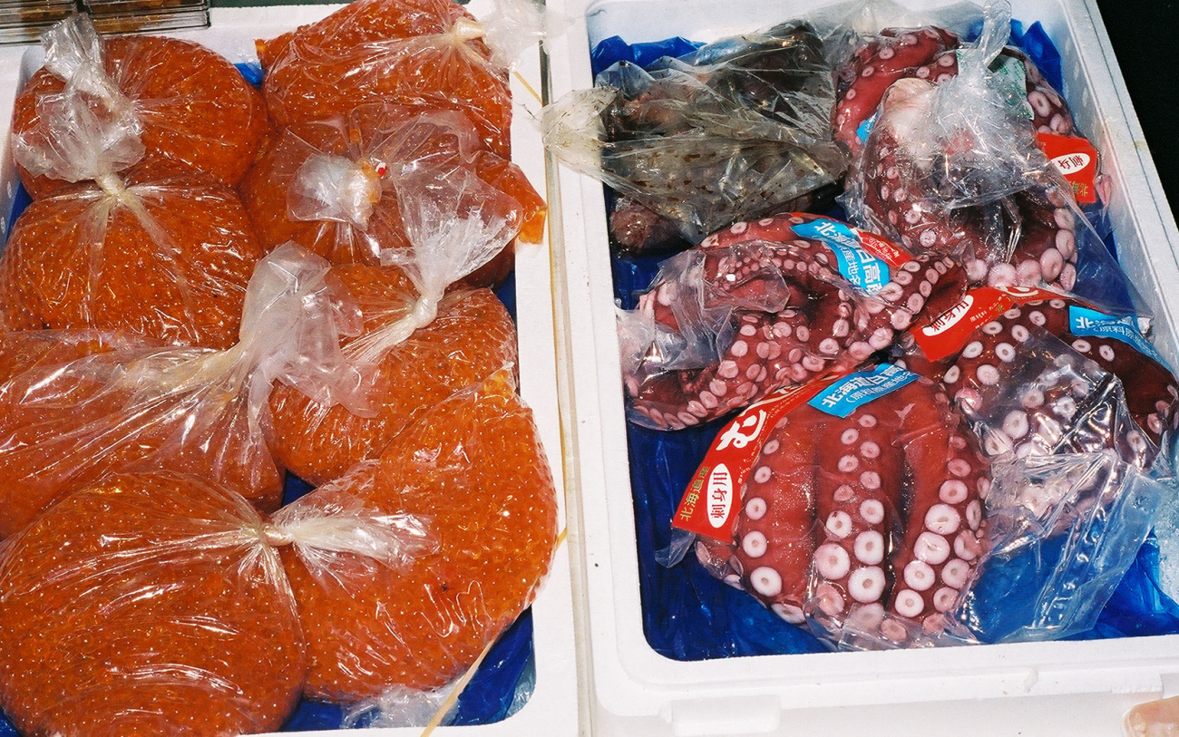 Salmon roe and octopus packaged for sale at the Shiogama market in Japan