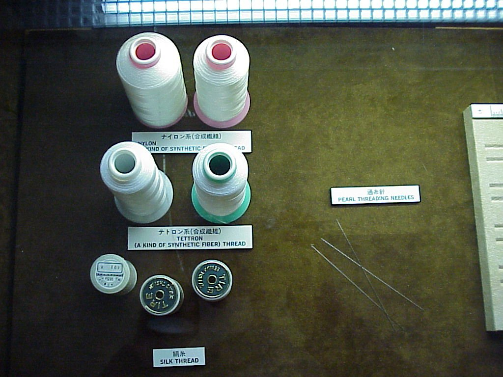 Examples of nulon, tettron, and silk threads used in the stringing of pearls