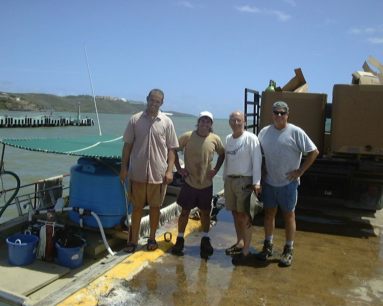 Staff preparing boat to tranport juvenile cobia to offshore cage in Puerto Ricoat Culebra Island