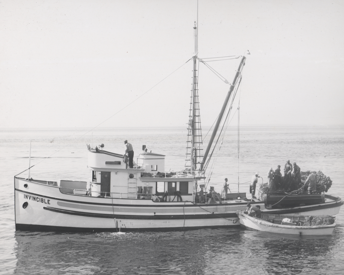 Sockeye salmon  purse seiner with net just hauled and preparing to turn table