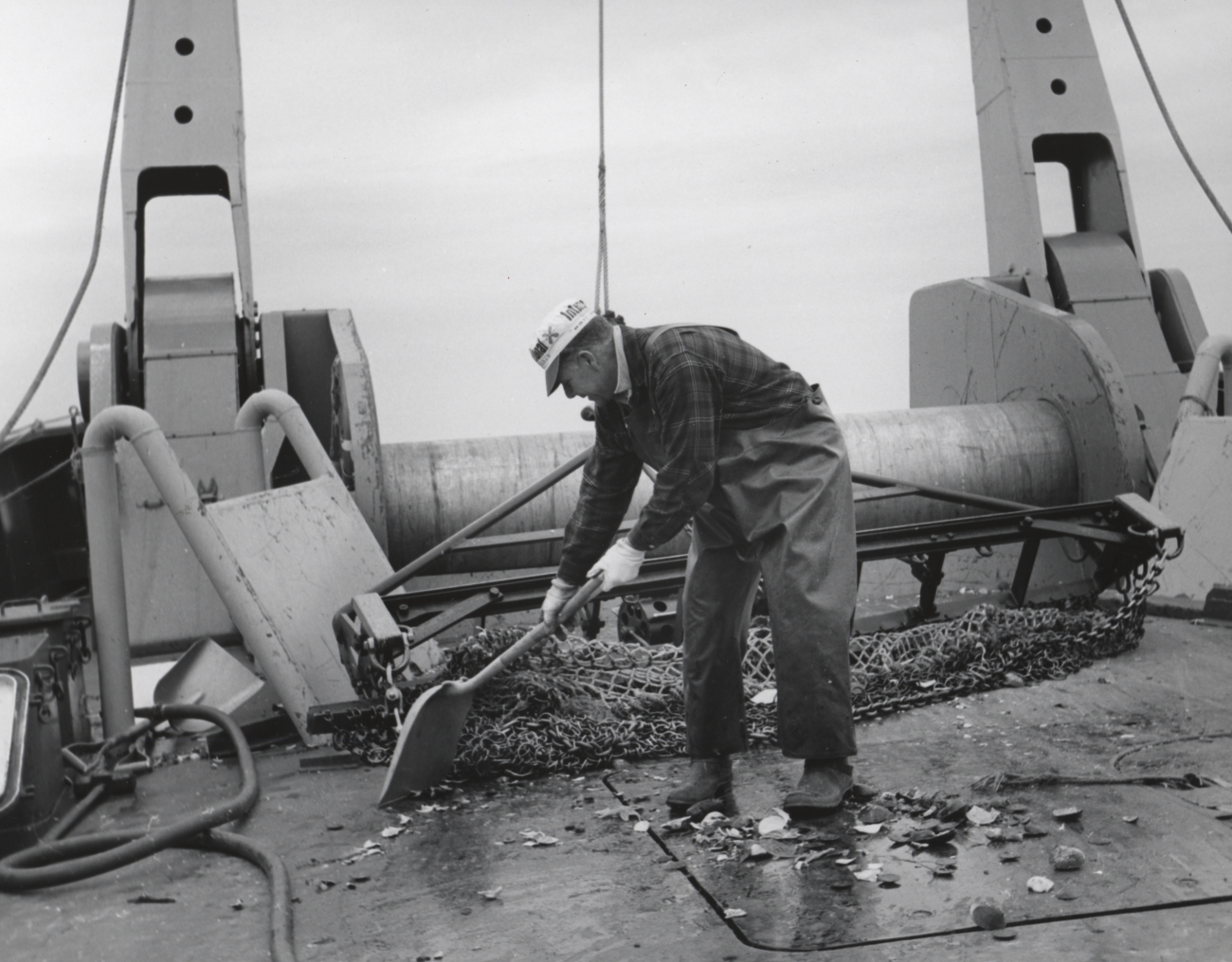 Clean up after culling through a haul from a sea scallop dredge on theBCF ship ALBATROSS IV