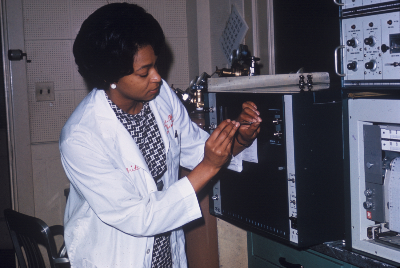 Chemist at BCF College Park Laboratory injecting a sample of fatty acids into agas chromatograph