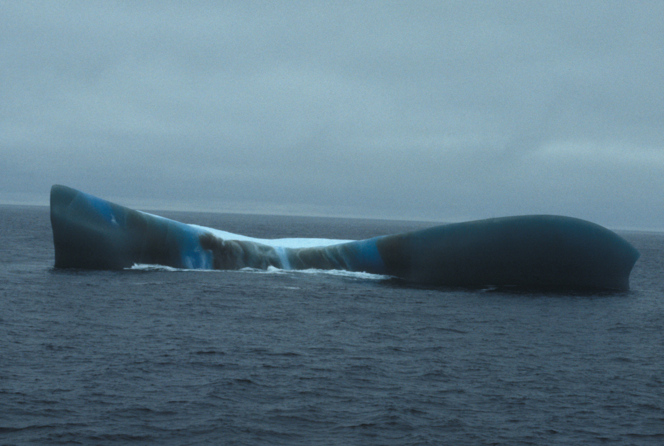 Iceberg with unusual color striations, South Shetland Islands