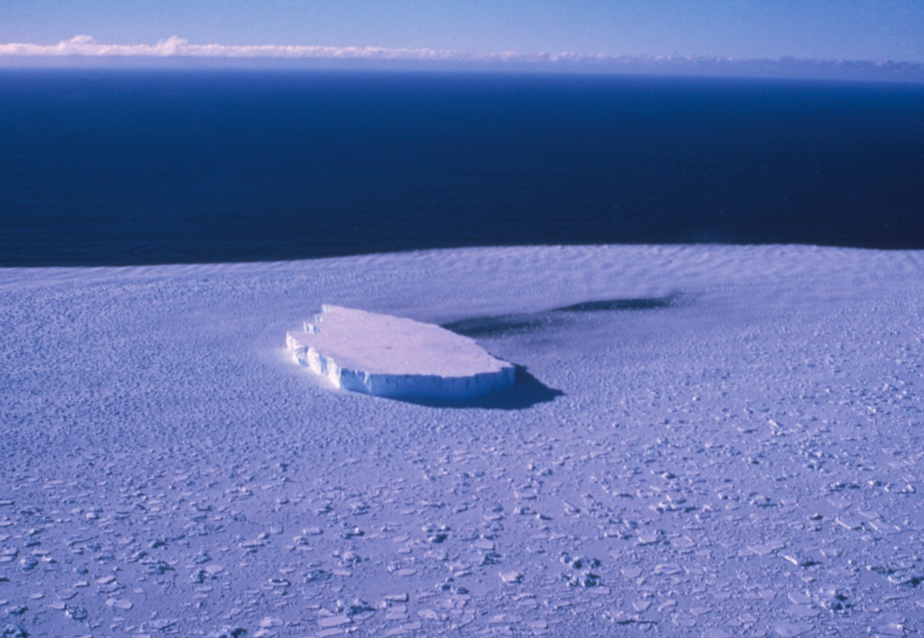 An iceberg in pack ice, Southern Ocean, South Shetland Islands