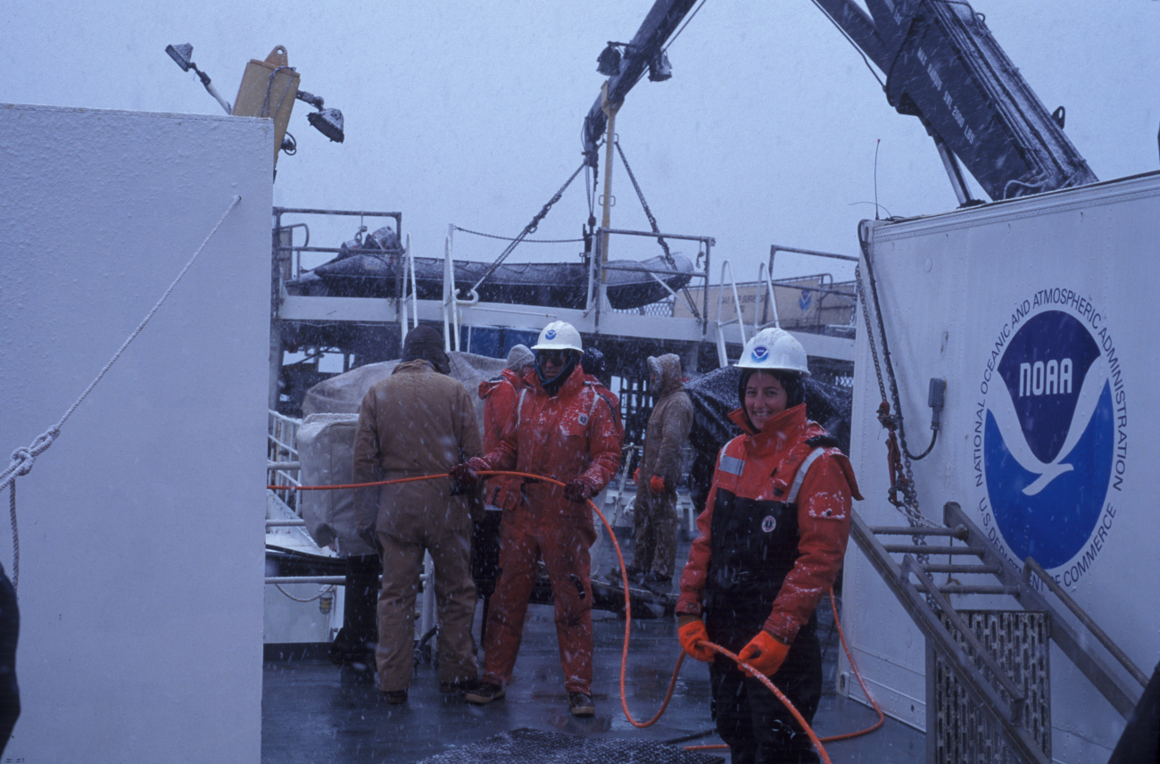 Jane Rosenberg handling ROV umbilical cord on NOAA Ship Surveyor