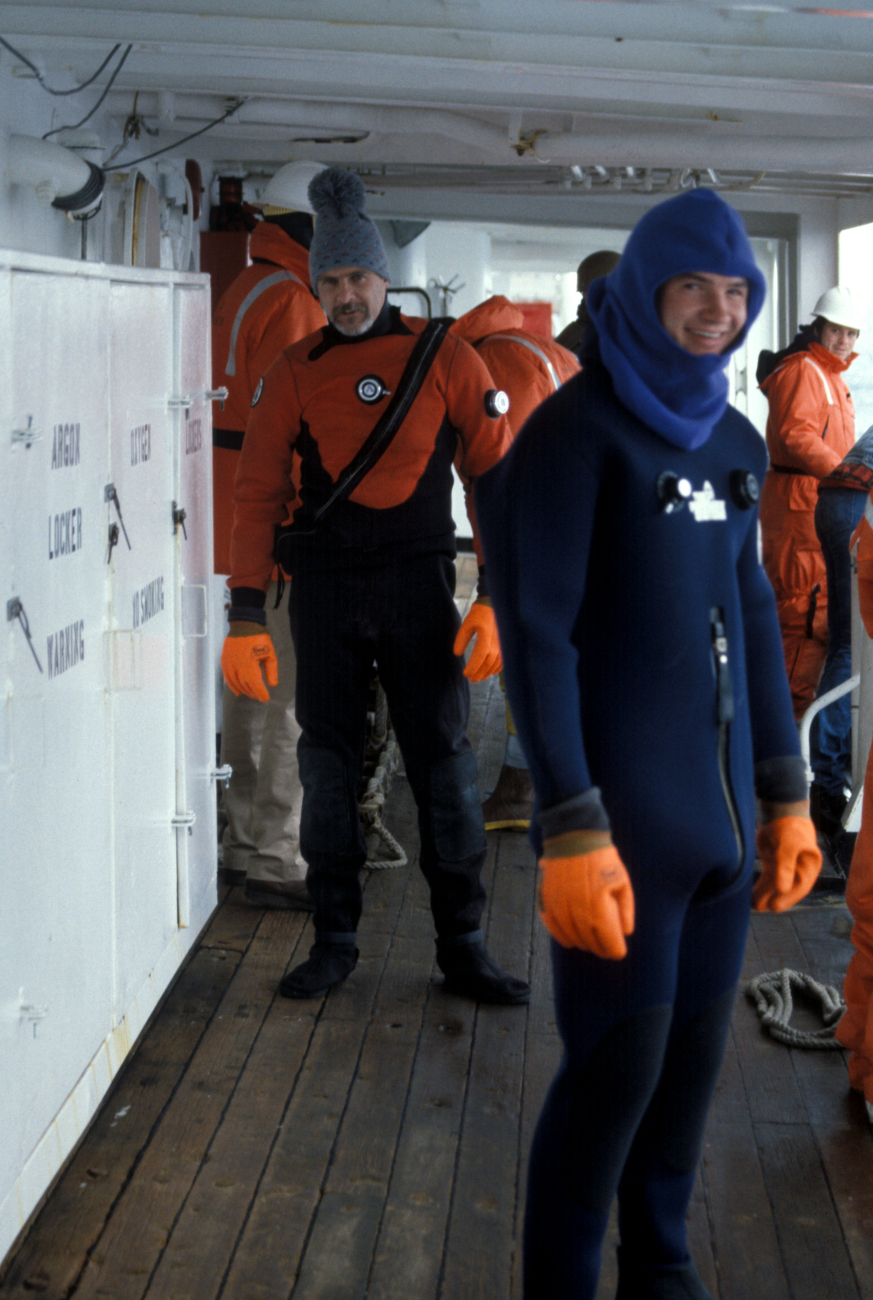 George Watters dons a survival suit for protection from icy Antarctic waters
