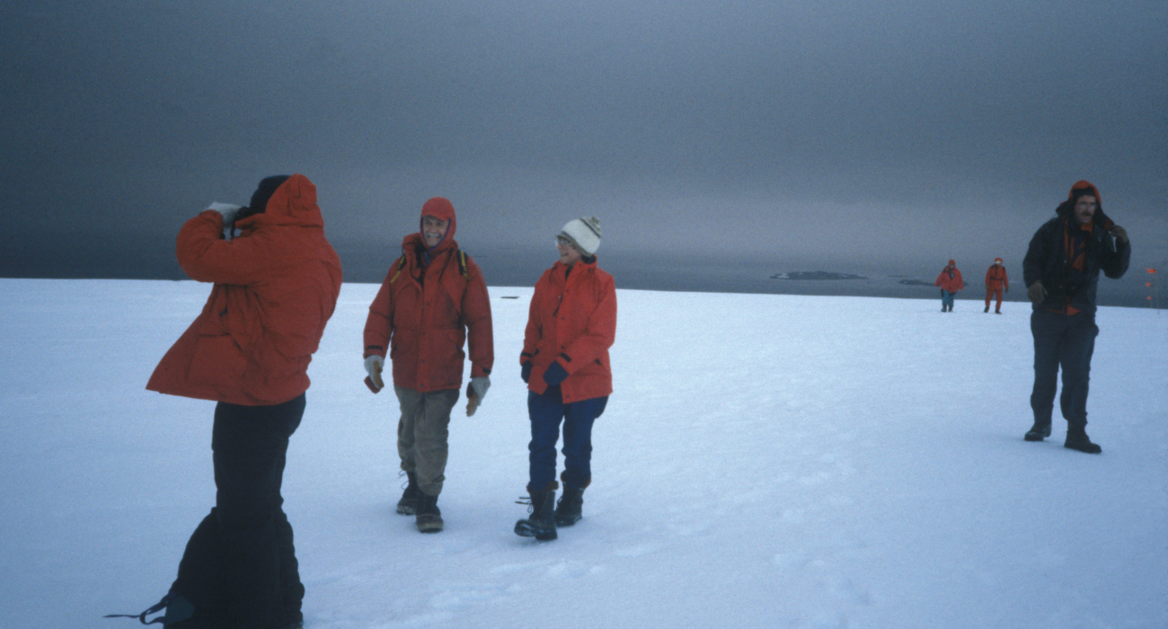 AMLR scientists traverse the snowy landscape, South Shetland Islands