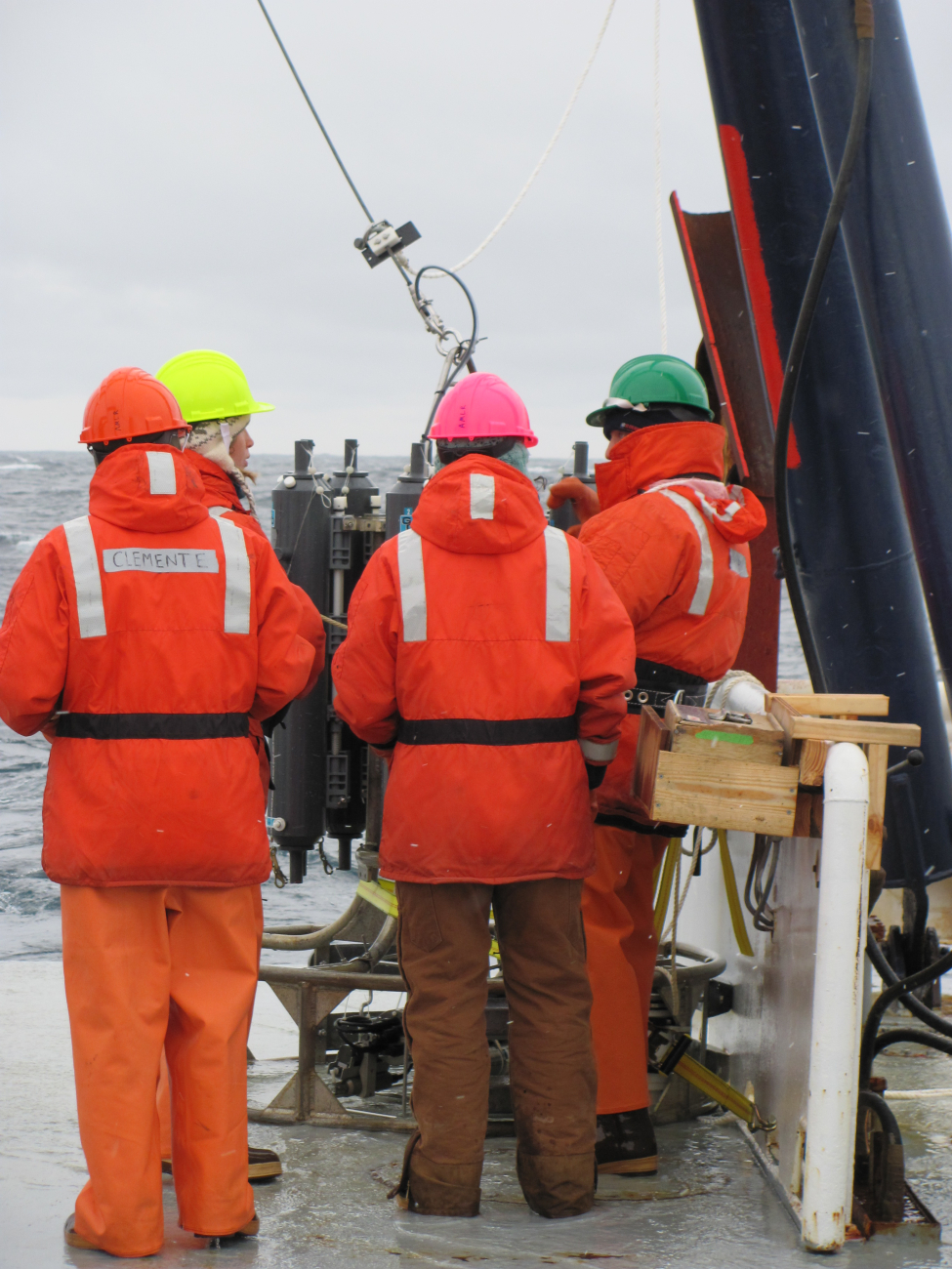 The AMLR crew works to deploy a CTD off the stern of the R/V Moana Wave