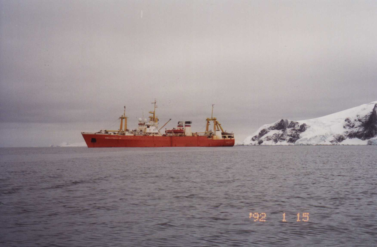 The R/V Yuzhmorgeologiya is visible from the shores of the AntarcticPeninsula as it awaits scientists visiting the Primaver Base