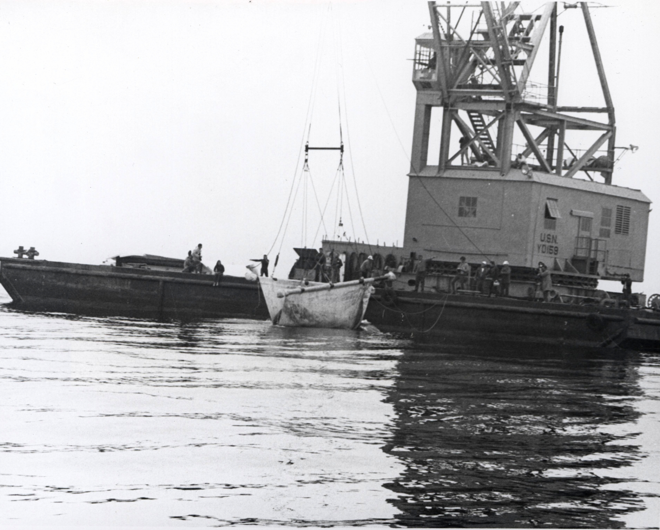 The 27-foot long Gigi is gently lowered into the sea after a year in captivity