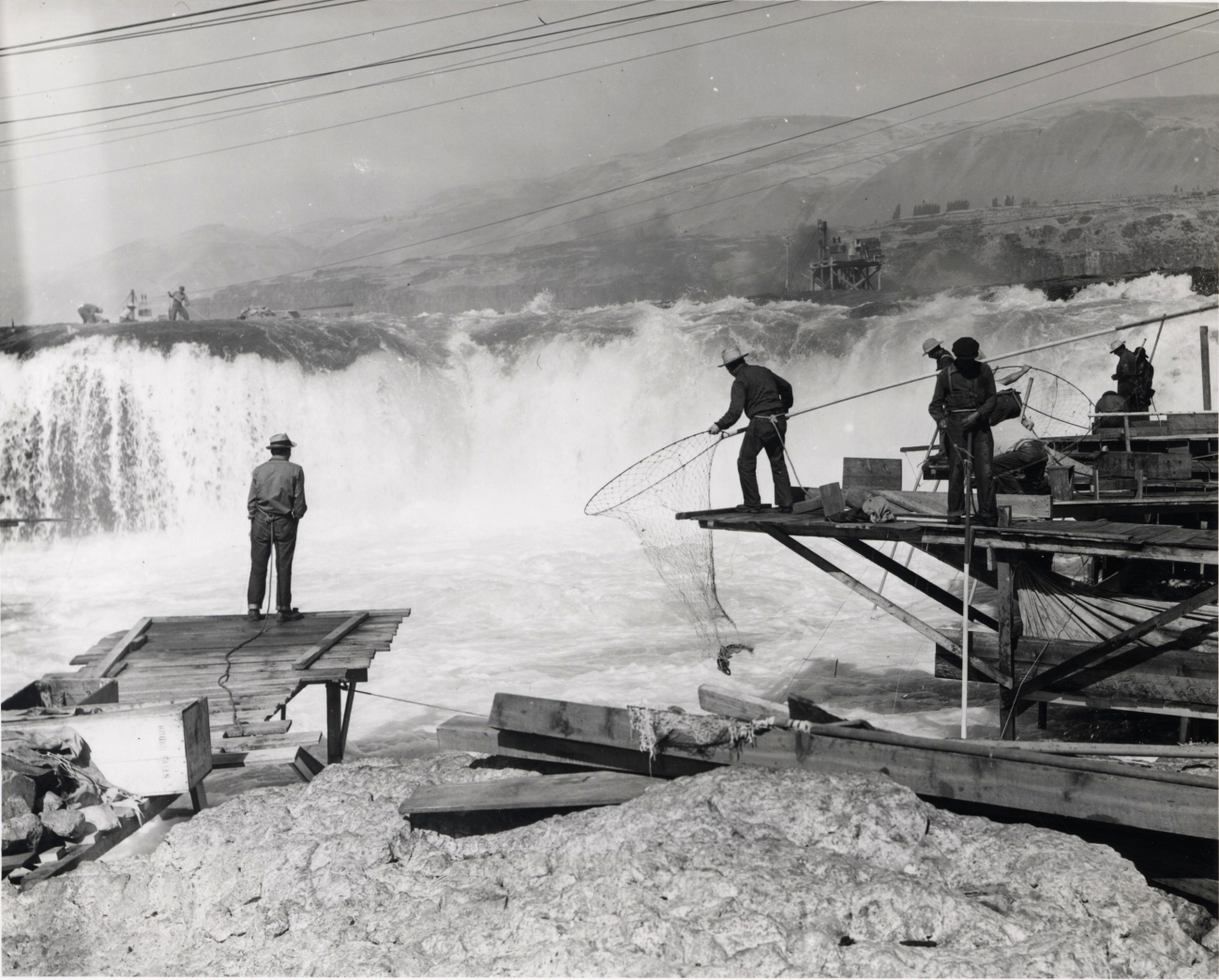 Salmon fishing with large loop nets by Indians at Celilo Falls, Oregon