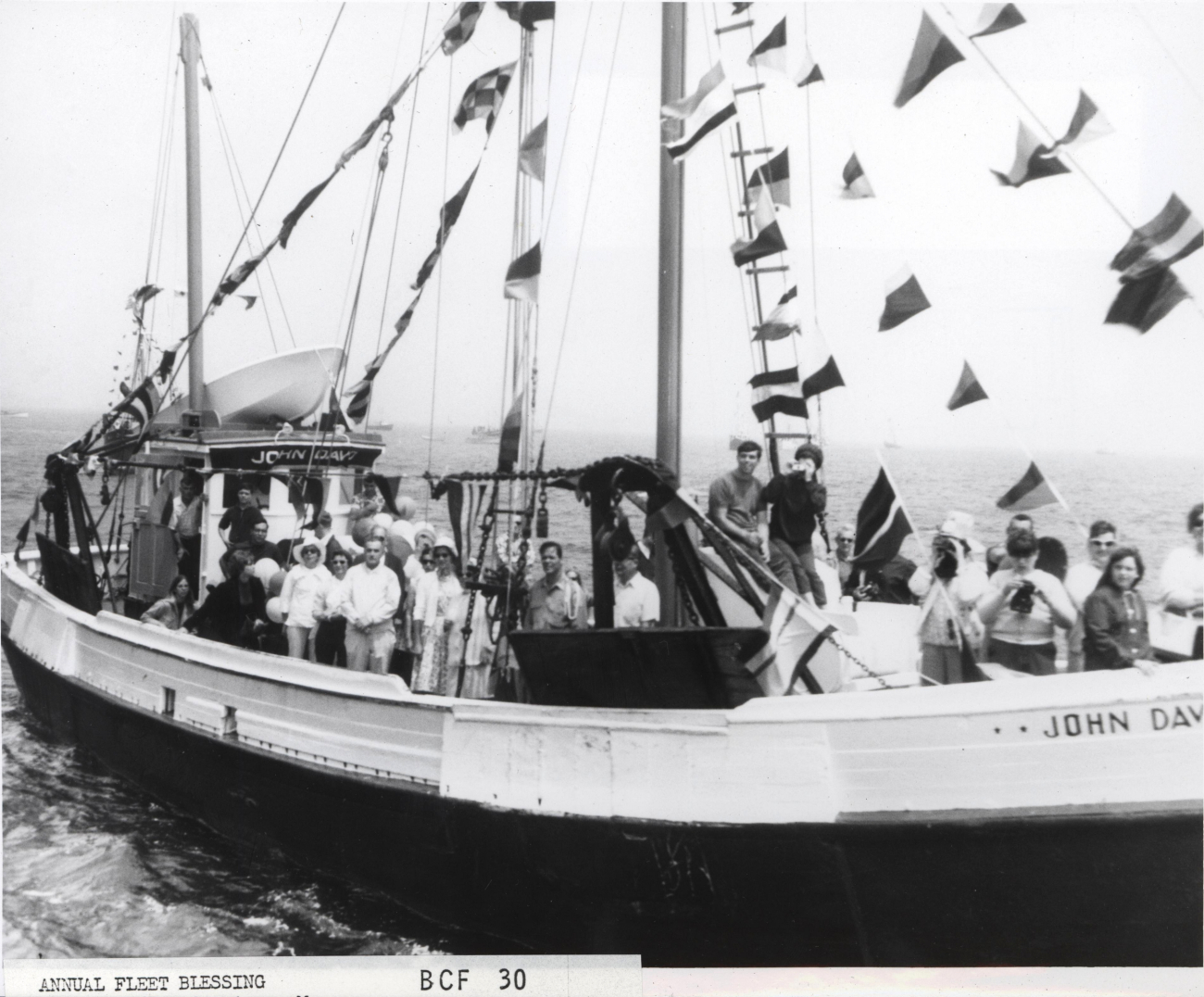 The fishing vessel JOHN DAY with family and crew members aboard duringAnnual Blessing of the Fleet