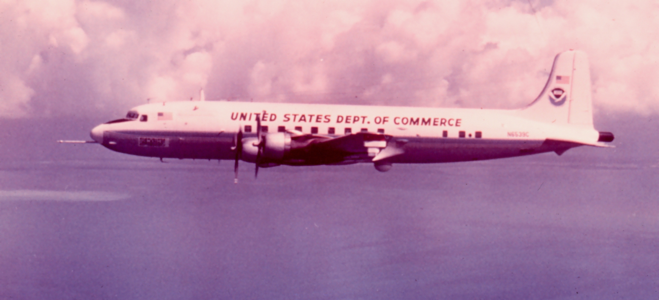 NOAA DC-6 N6539C in flight