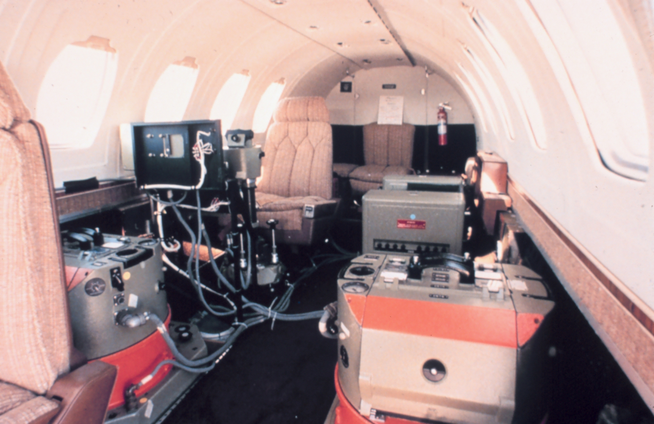 Looking aft in cabin of NOAA Cessna 550 Citation II used forphotogrammetric missions and remote sensing