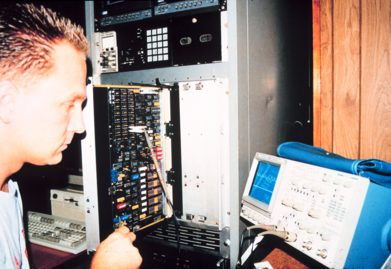 Jim Barr working in electronics workshop