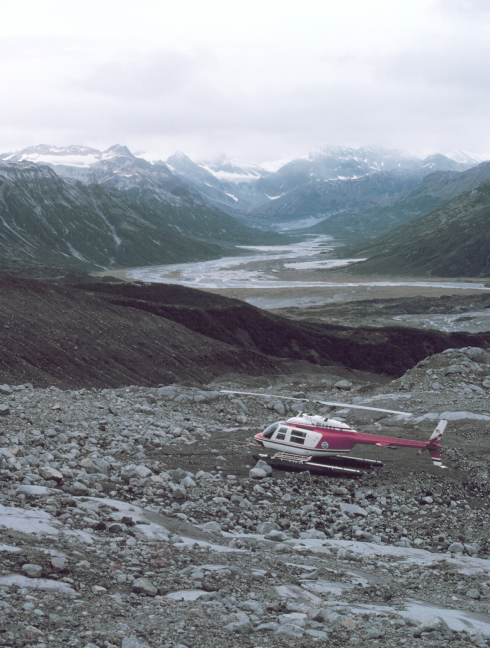 Leased Bell 206 on Redoubt Volcano during seismic observation surveys byUniversity of Alaska for OCSEAP