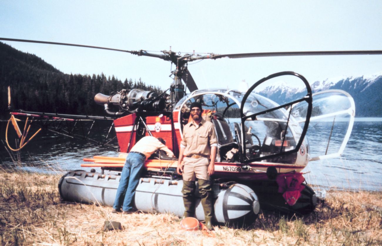 Contract helicopter transporting NOAA geodetic surveyors in southeast Alaska