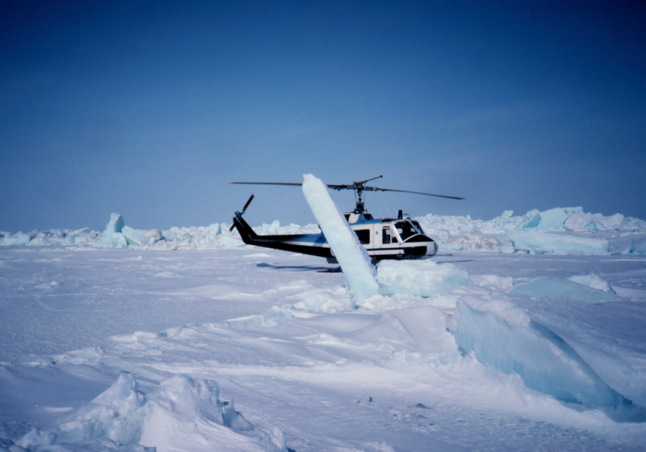 Bell UH-1M on the ice of the Beaufort Sea conducting seal research
