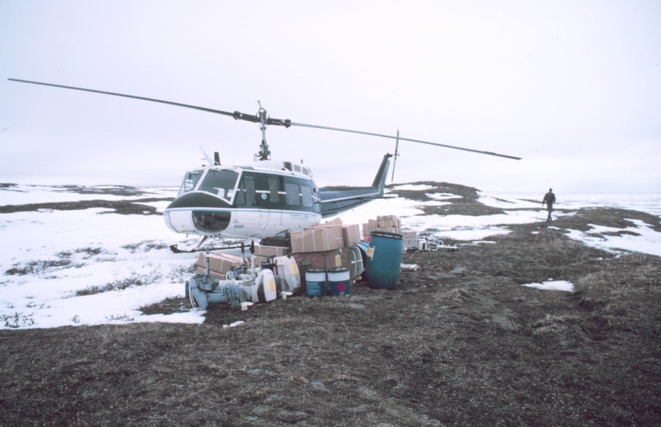 Unloaded Bell UH-1M helicopter with camp gear for bird studies in the PrudhoeBay area at remote camp site
