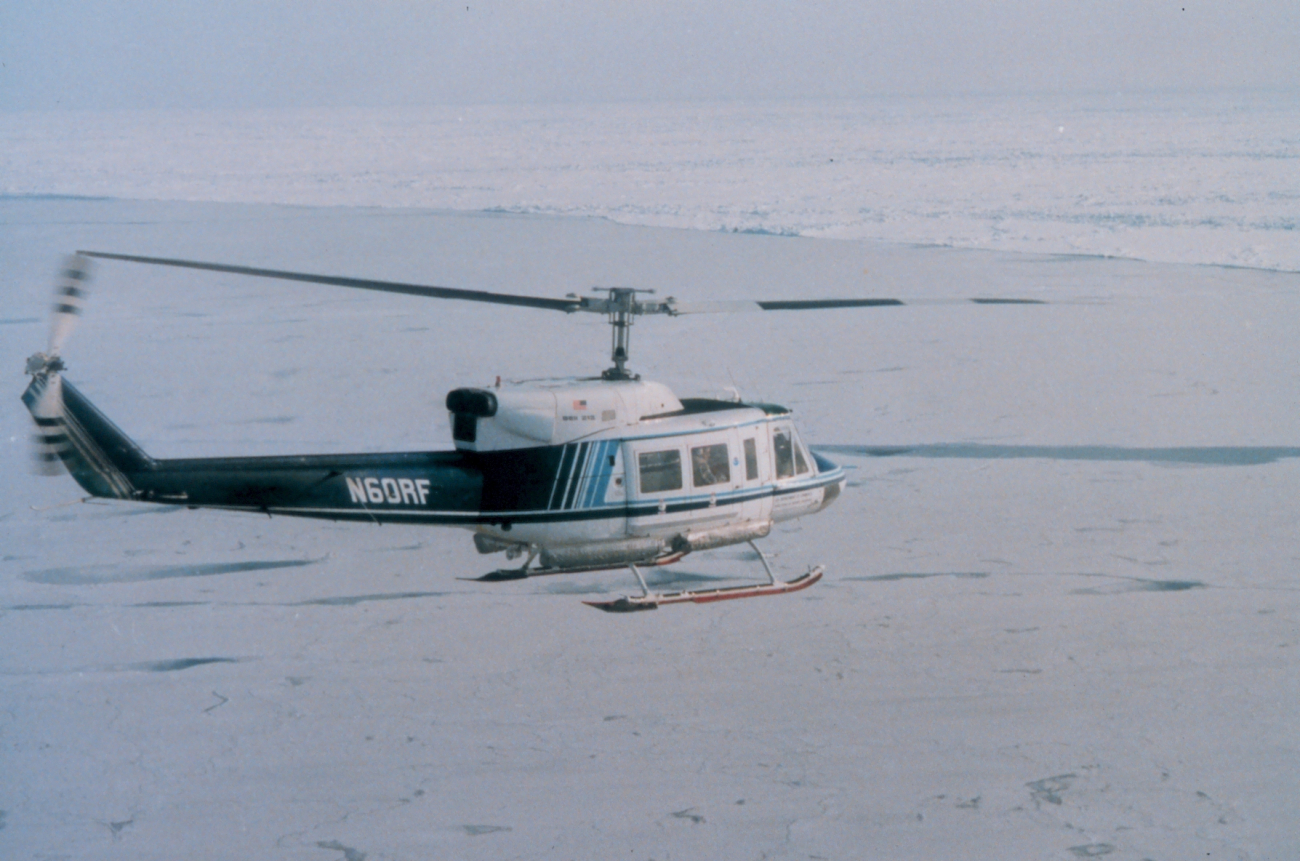 NOAA Bell 212 flying over North Slope of Alaska approaching the ice of theBeaufort Sea