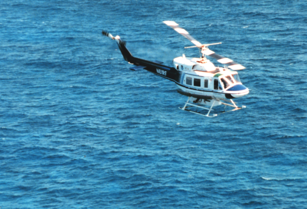Bell 212 helicopter equipped with SHOALS Lidar sounding system off Cancun,Mexico
