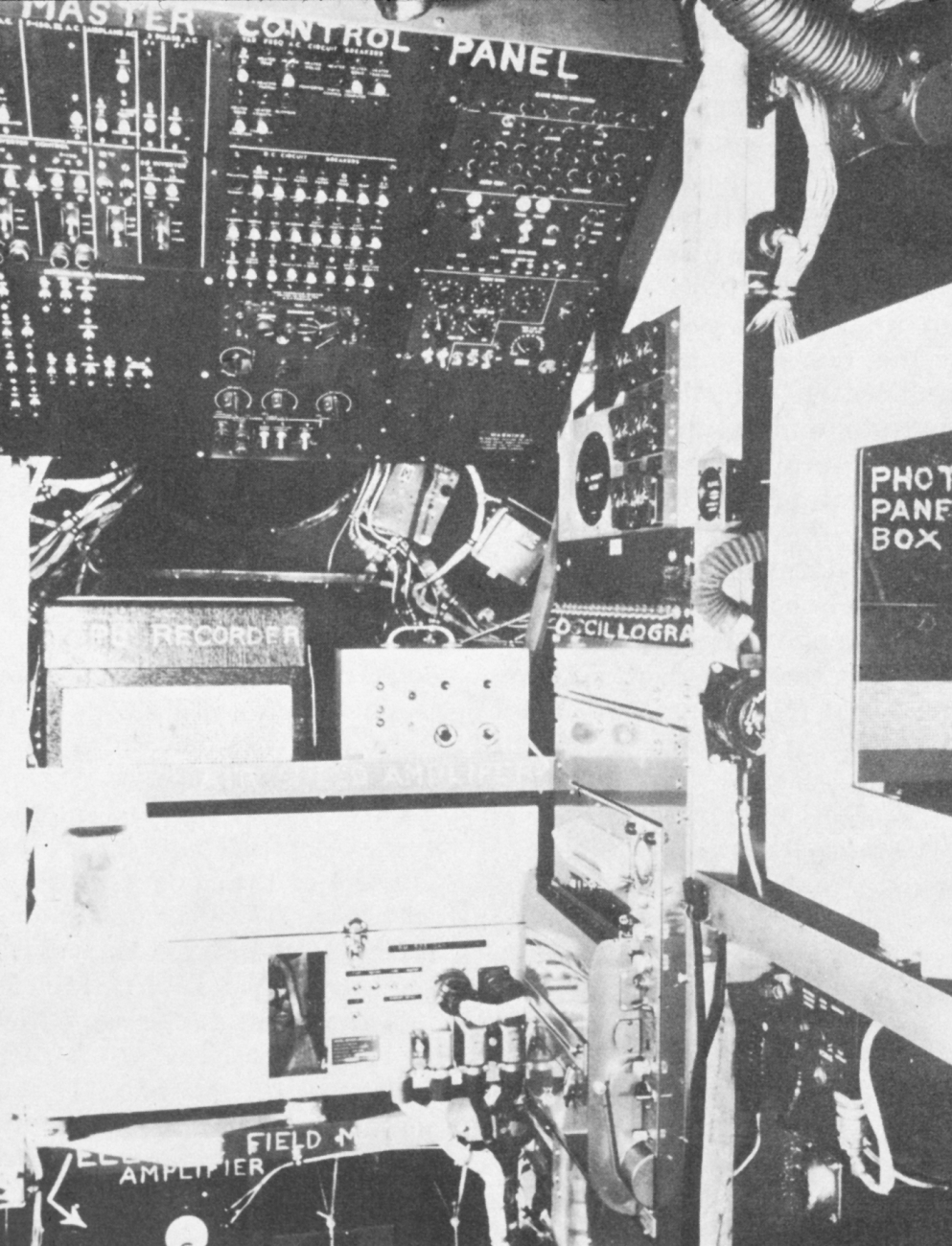 Technicians position in the B-50, an Air Force aircraft loaned to the WeatherBureau for hurricane research