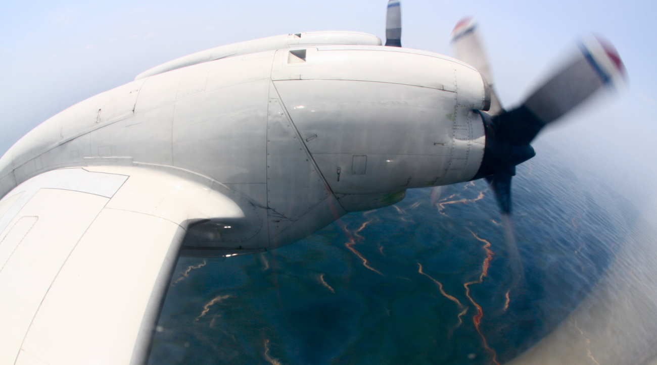 The Deepwater horizon oil slick seen from the window of the Lockheed WP-3DOrion aircraft