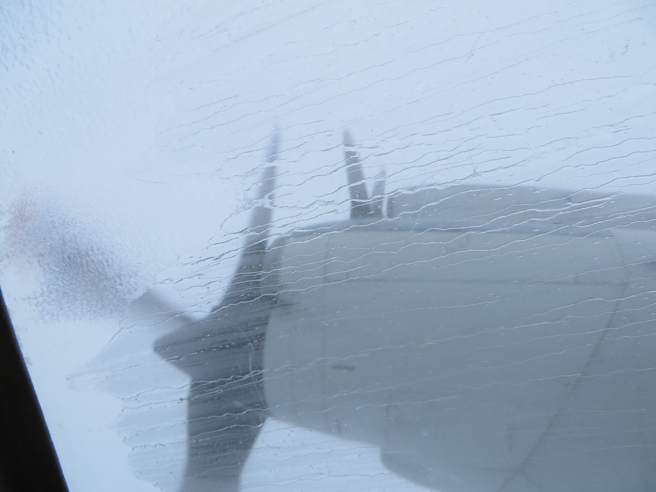 Rain streaking the windows of NOAA P-3 flying into Hurricane Edouard