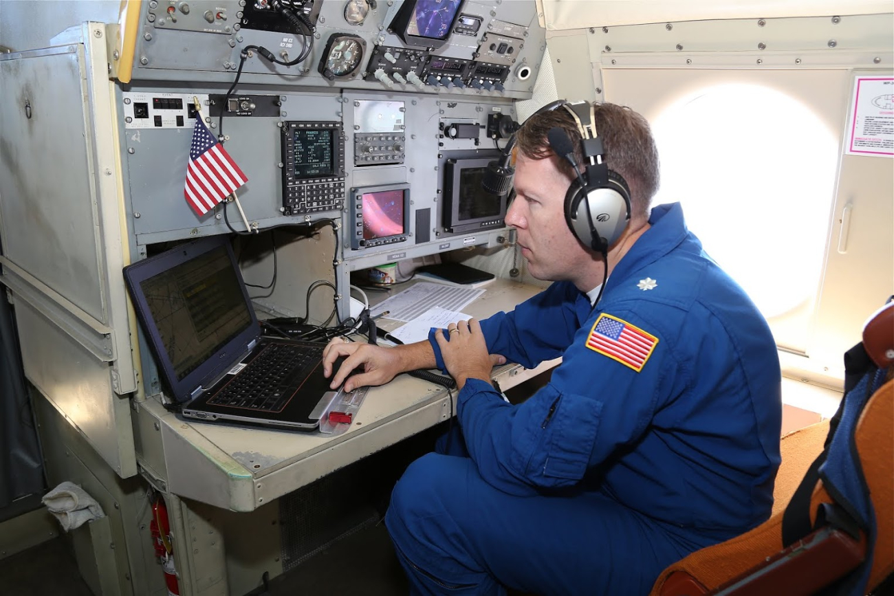 Navigator Commander Pete Siegel, NOAA Corps, in NOAA P-3 N42RFflight into Hurricane Edouard