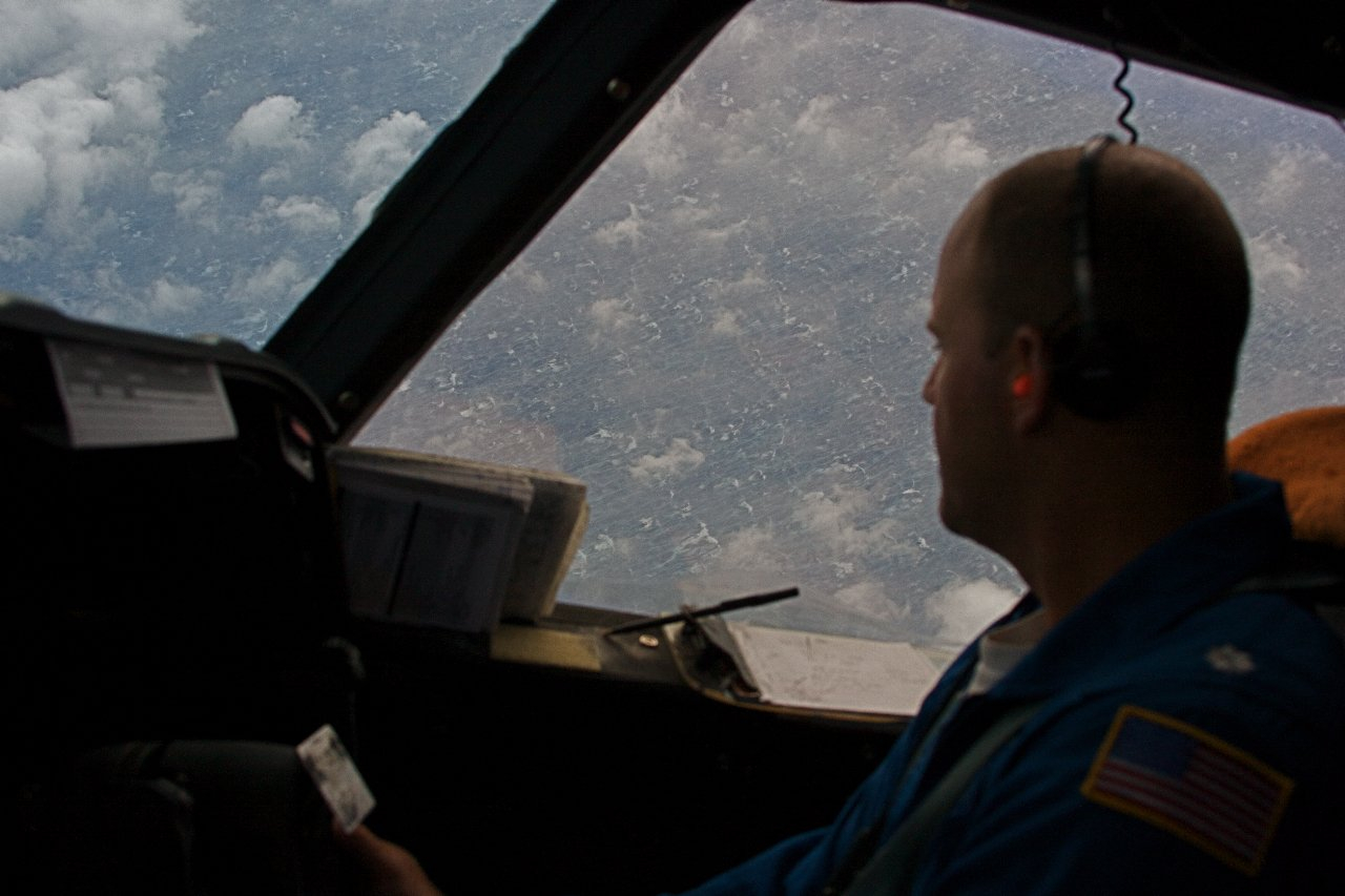 NOAA P-3 pilot looking down on the agitated sea surface of Hurricane Ike