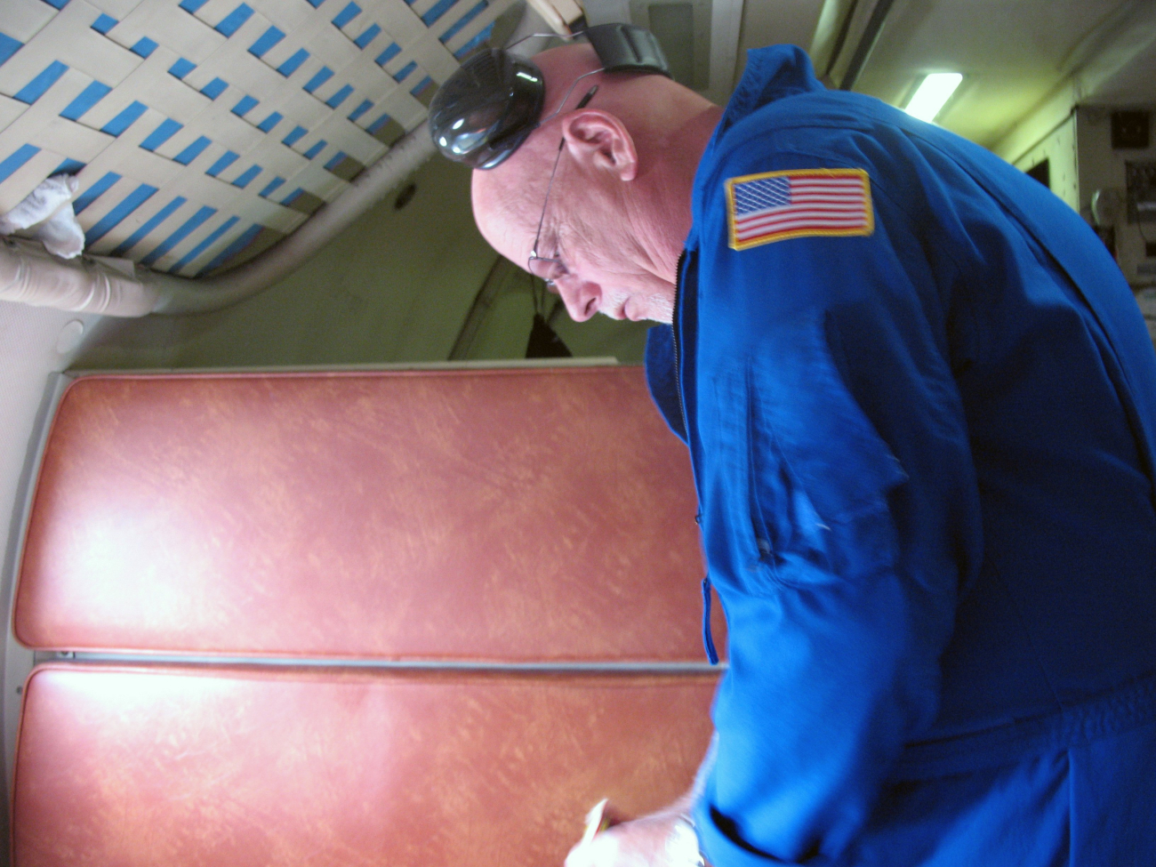 Member of science crew of NOAA WP-3D Orion making preparations forentering Hurricane Ike