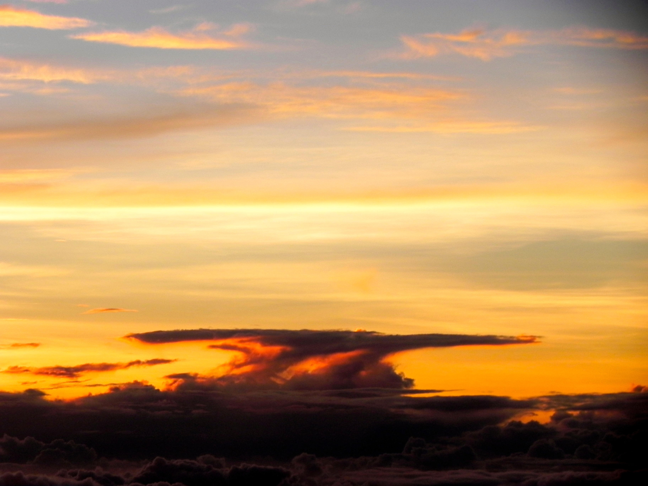 Thunderstorm anvil seen at sunset during mission to Hurricane Cristobal