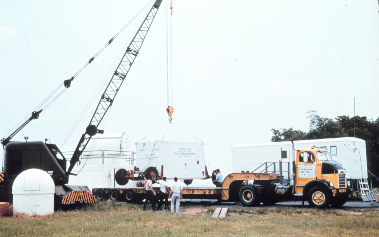 Loading a synchronization console on a truck for shipment at the Beltsvillesupport facility
