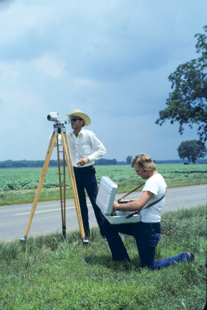 James Lindly observing and Leo Gittings recording leveling observations
