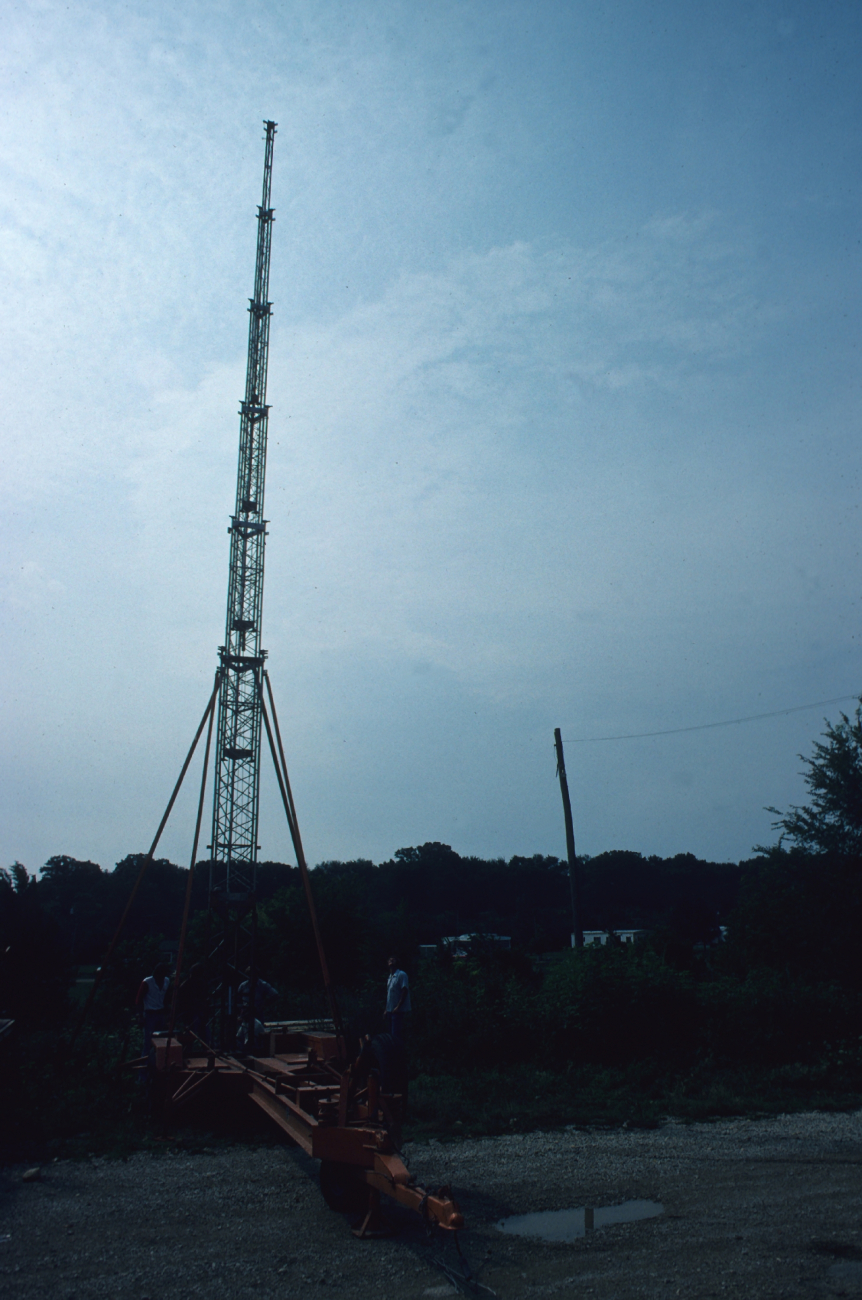 TMT being telescoped next pre-erected telephone pole