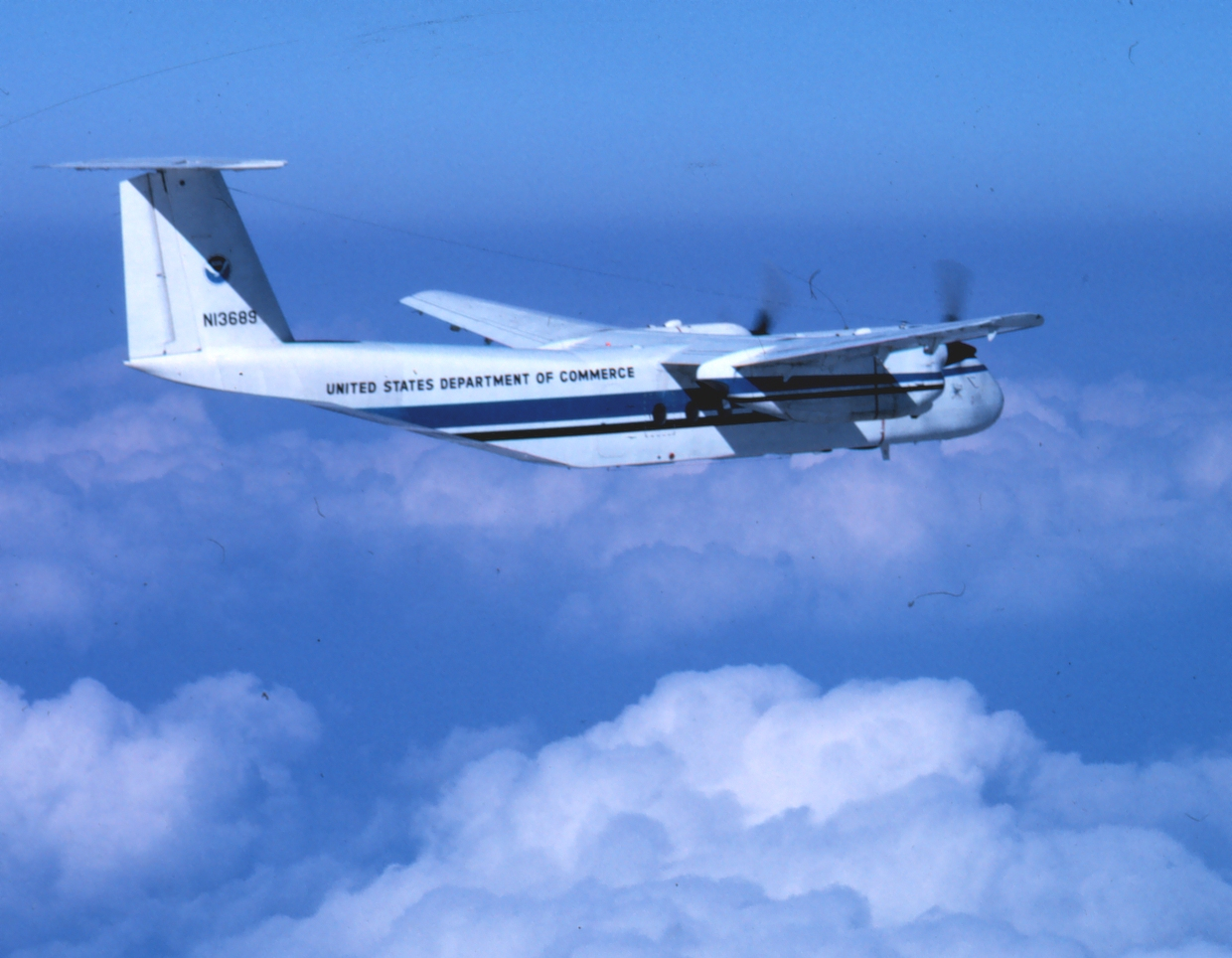 NOAA de Havilland Buffalo N13689 flying, starboard quarter view