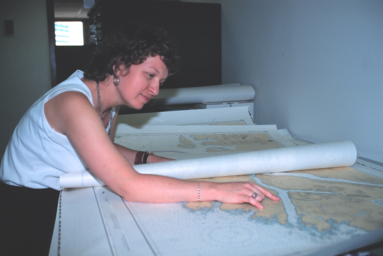 Jessica Durley, a cartographic technician with the National Geodetic Survey,working with nautical charts