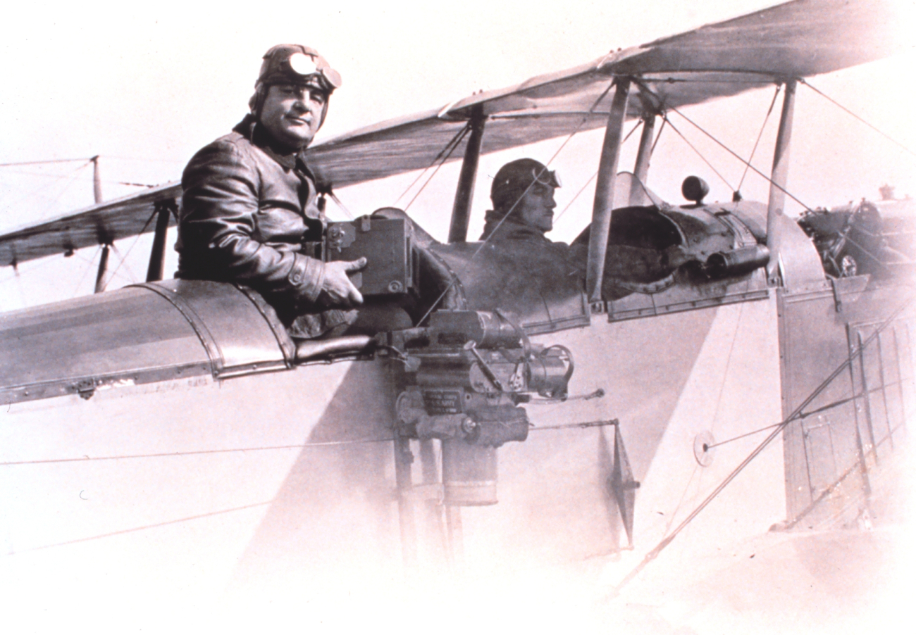 World War I era aerial photography with a side-mounted camera and open cockpitbi-plane