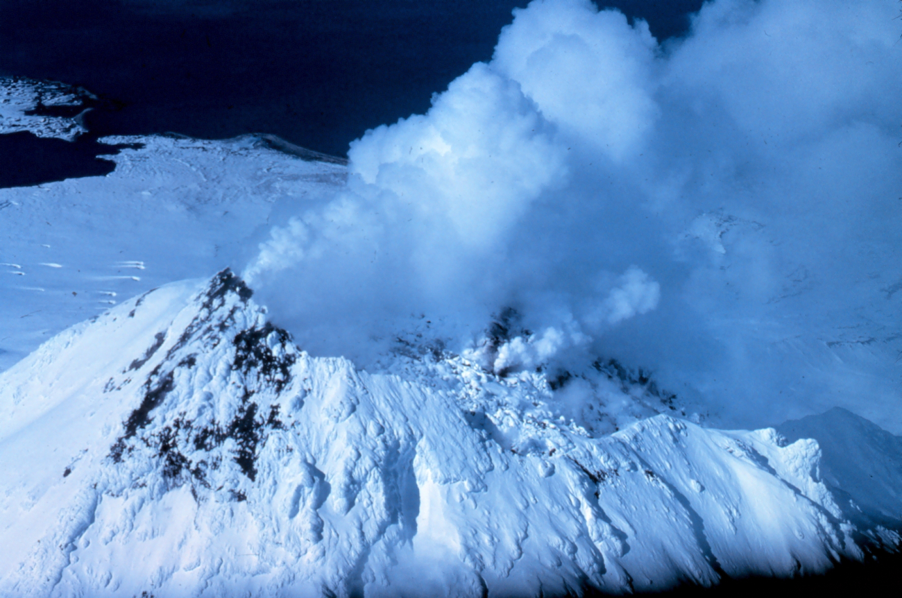 Snow and steam make an incongruous picture on Augustine Volcano
