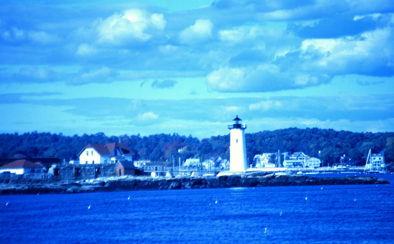 A view of the lighthouse guarding the harbor entrance