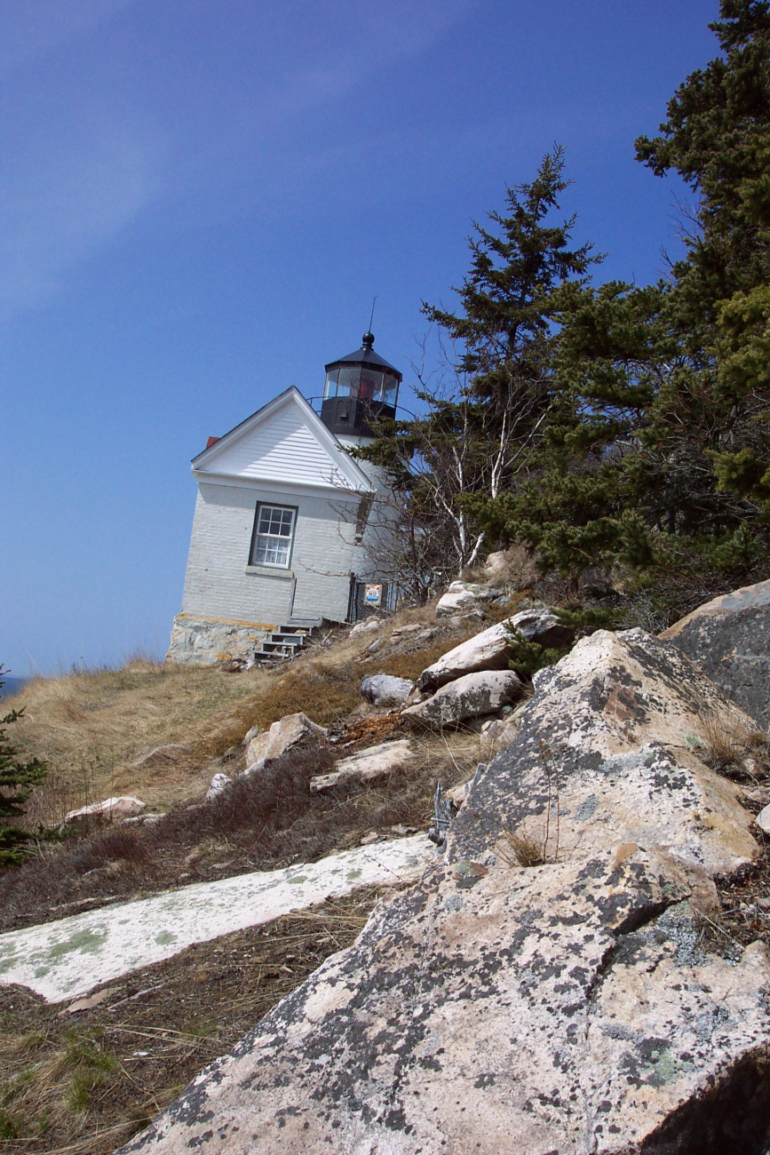 Bass Harbor Head Lighthouse as seen from the east and cliffside
