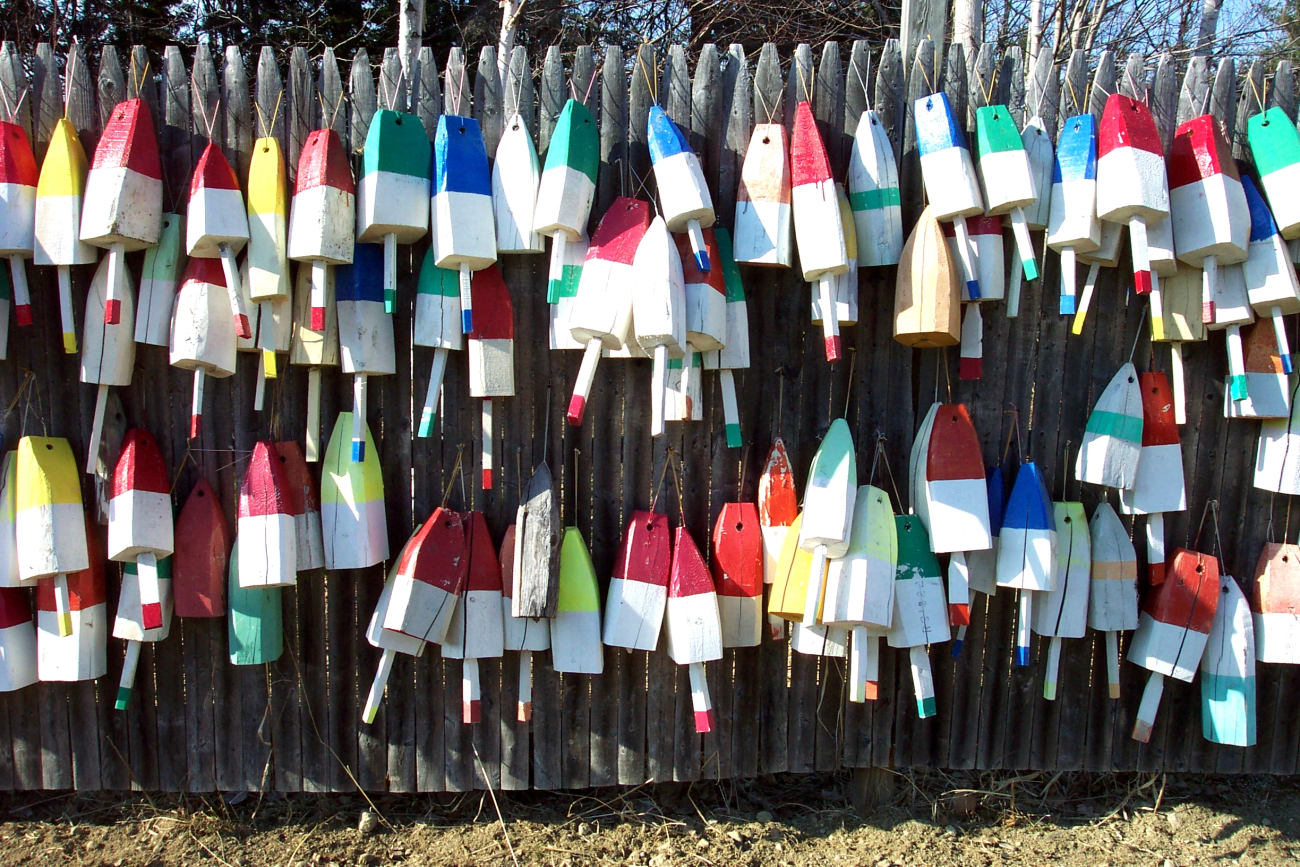 Floats for lobster traps adorning a Maine fence
