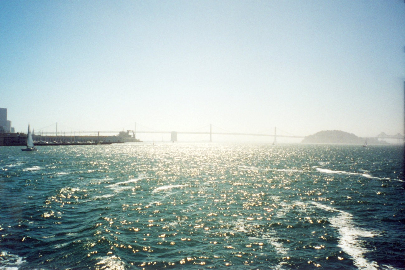 Looking down the bay towards the San Francisco - Oakland Bay Bridge on ahazy afternoon