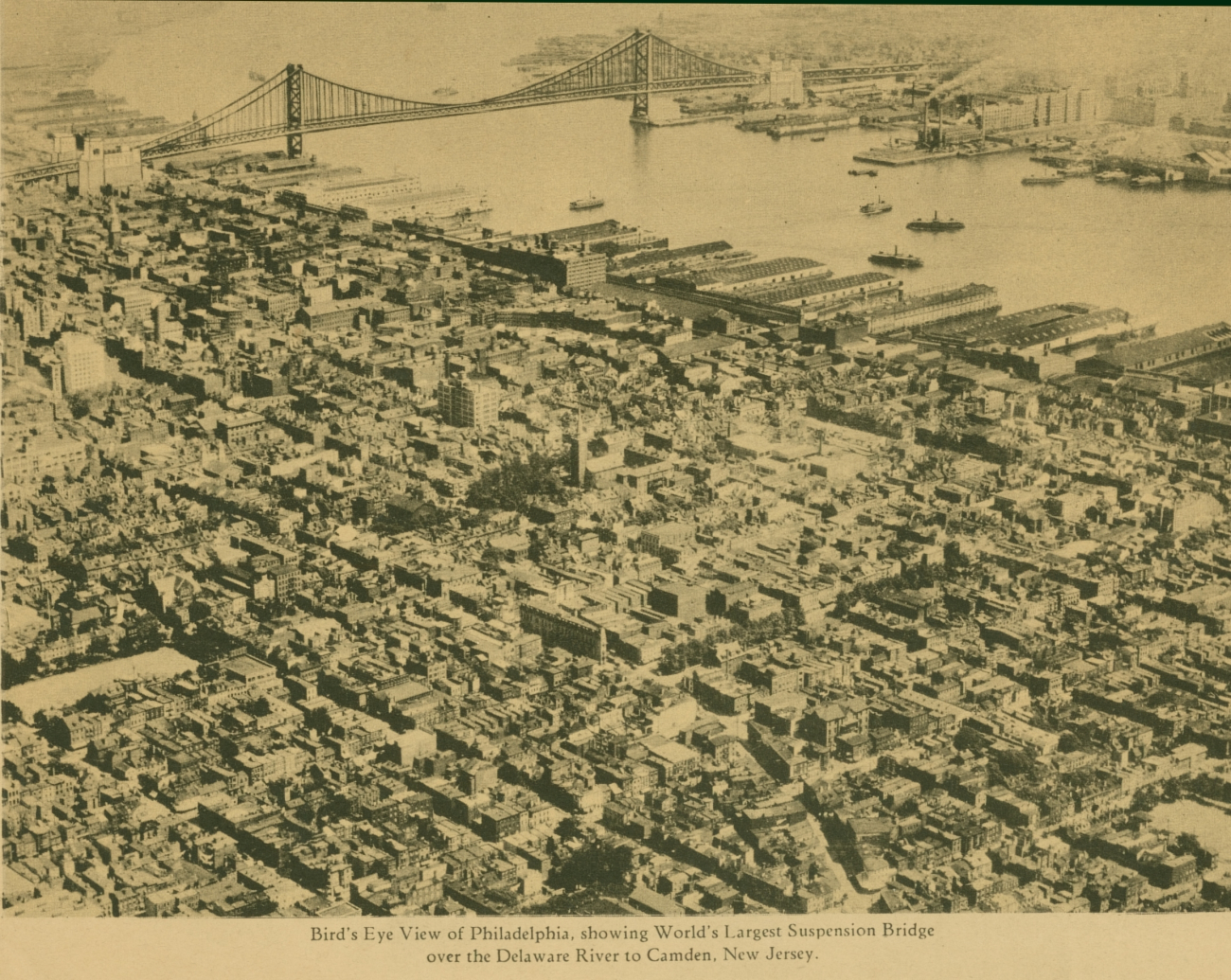 Aerial view of downtown Philadelphia and the Philadelphia waterfront showingwhat was then the world's largest suspension bridge