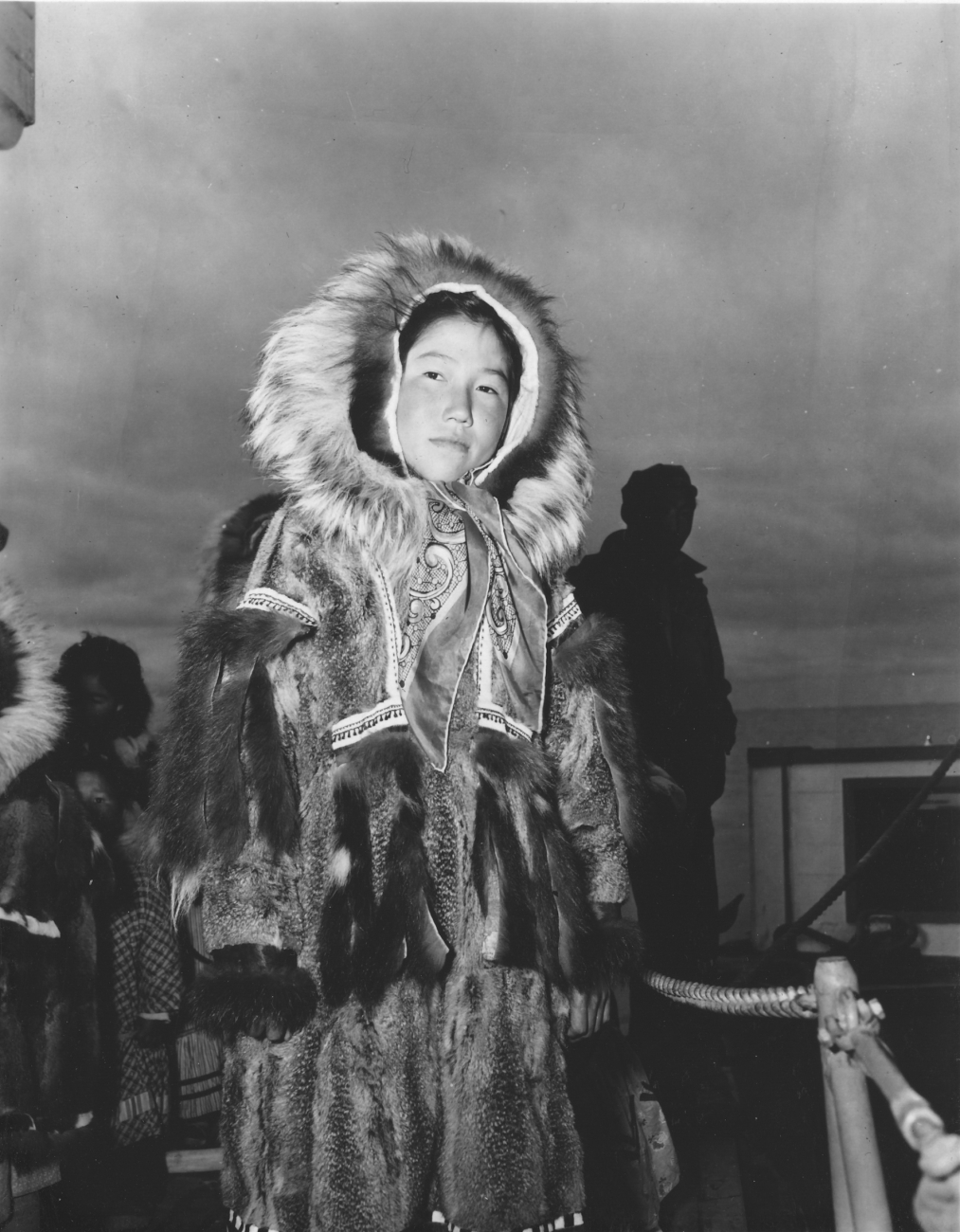 Eskimo girl visiting the C&GS; ship EXPLORER, probably at St