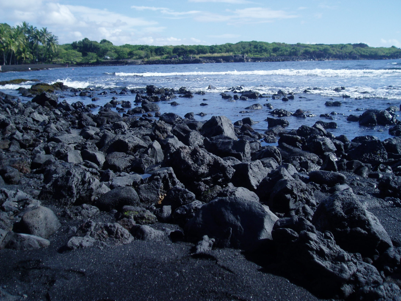 A recent lava flow forms the beach on the southeast side of the big island