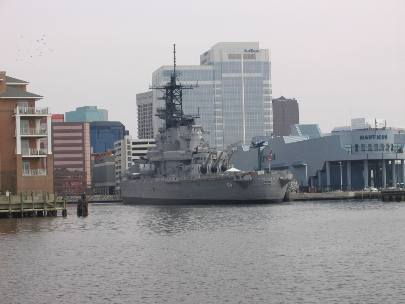 The battleship WISCONSIN tied up next to Nauticus on the Norfolkwaterfront